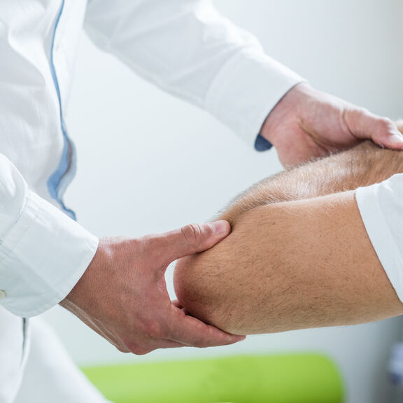 Ellenbogen Hand
